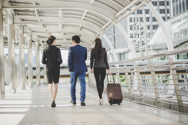 /files/business-man-woman-are-going-business-trip_1150-2983.webp